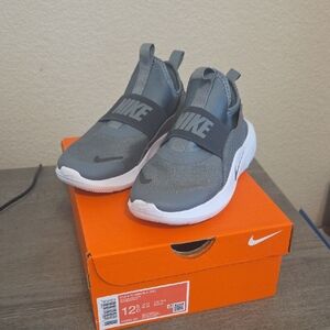 Nike Kids Gray and White Slip-On Sneakers